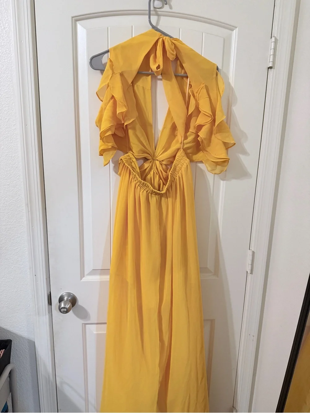 Sleeveless Ruffle Cutout Maxi Dress in Mustard “Carlita Ruffle Cutout
Maxi Dress - Picture 6 of 7